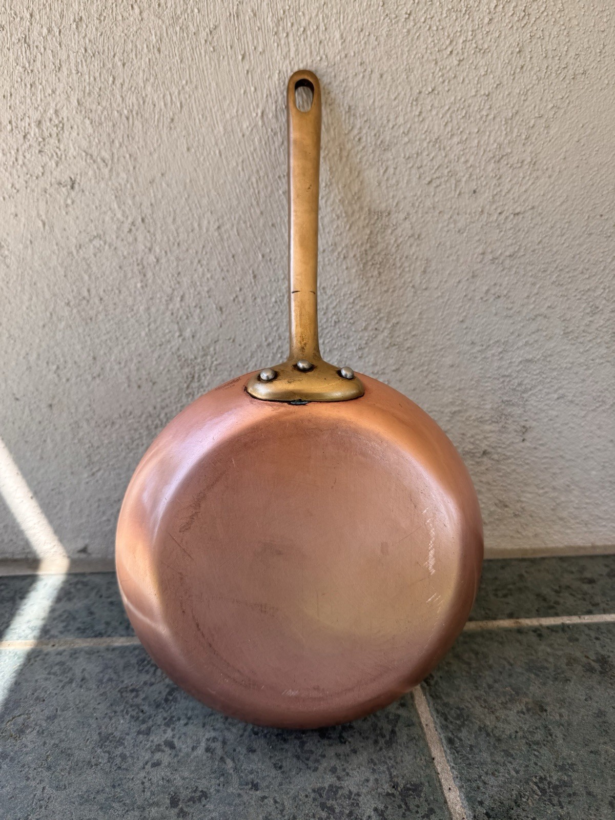 Mauviel copper skillet with brass handle.