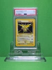 POKEMON 1999 BASE SET ZAPDOS HOLO 16 PSA 7