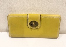 vintage yellow Coach Hampton turnlock wallet