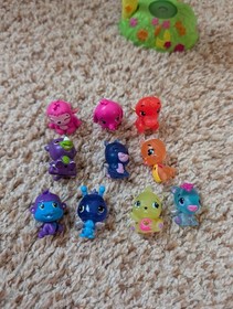 10p Mixed hatchimals w/ Playset Accessory Display Stand that lights up.