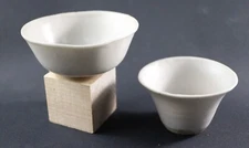 Two Chinese 16-17 Century Ming white glazed small cup dish