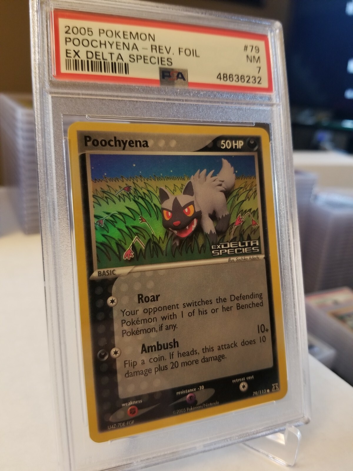 PSA 7 - POOCHYENA REVERSE HOLO - Pokemon TCG: EX Delta Species #79