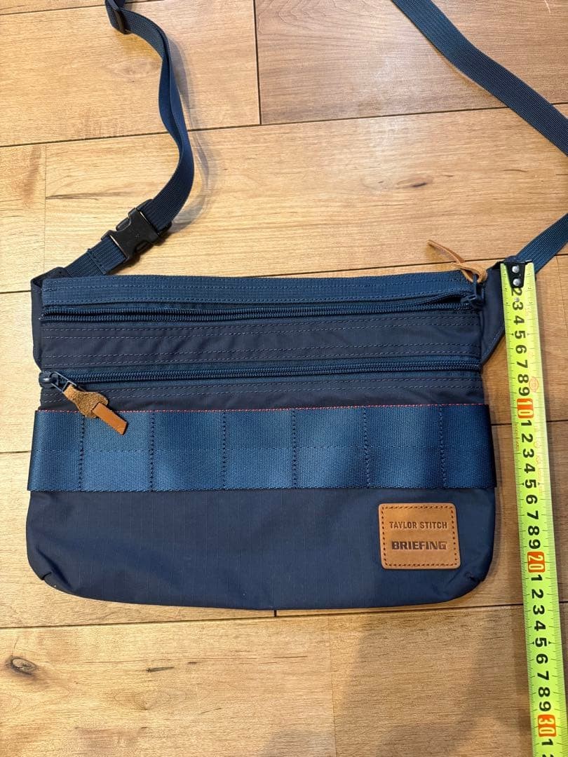 BRIEFING Navy Shoulder Bag Adjustable Strap Front Pocket
