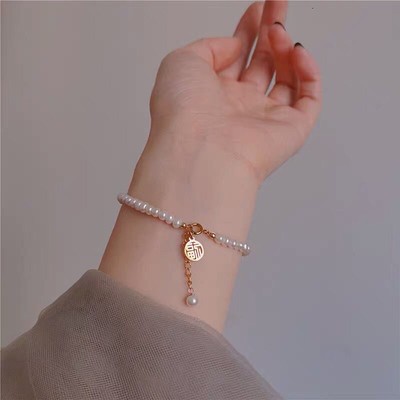 Stilvolles Bettelarmband mit Perlen und Gold elegante Erg?nzung f??r Damengarde
