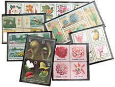 7 UNITED STATES COMMEMORATIVE SETENANT BLOCKS OF MNH STAMPS WITH MOUNTS