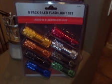 ALUMINUM LED FLASHLIGHT SET OF 8 HEAVY DUTY & BRIGHT BRAND NEW CASE FRESH MINT