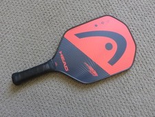 HEAD EXTREME PRO PICKLEBALL PADDLE...PREOWNED. RED AND BLACK WITH BLACK GRIP...