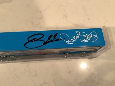 BUBBA WALLACE & PETTY AUTOGRAPHED 2019 STP RPM TRANSPORTER DIECAST & CARDS