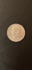At melt  1966 Kennedy Half Dollar 40% Silver Uncirculated Better Than Photo