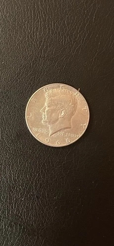 At melt  1966 Kennedy Half Dollar 40% Silver Uncirculated Better Than Photo