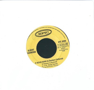 DISCO 45 GIRI ALBERT HAMMOND - IT NEVER RAINS / ANYWER HERE IN THE PUBLIKUM