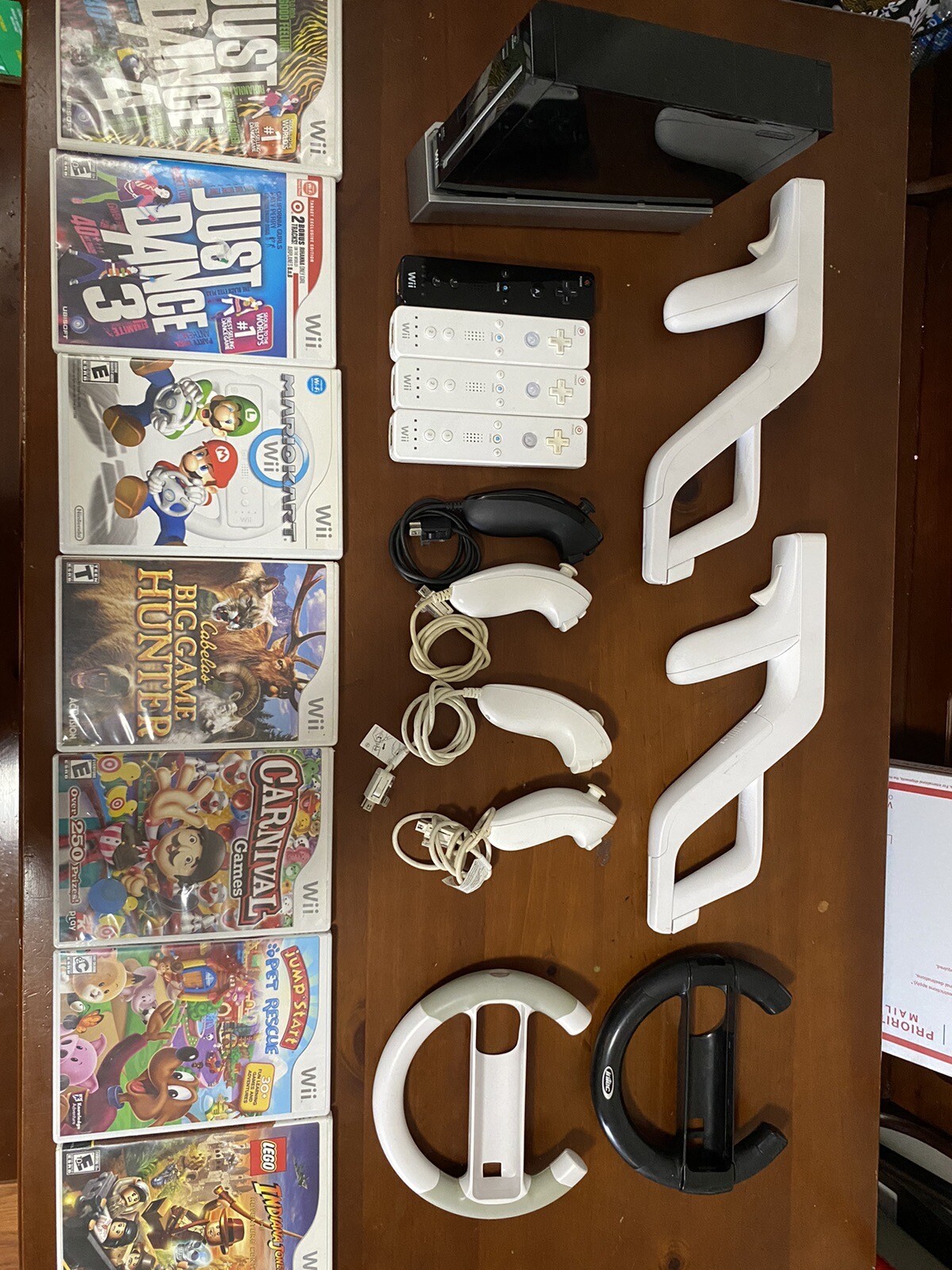nintendo wii black console bundle 7 games, 4 Controllers,4 Nunchucks