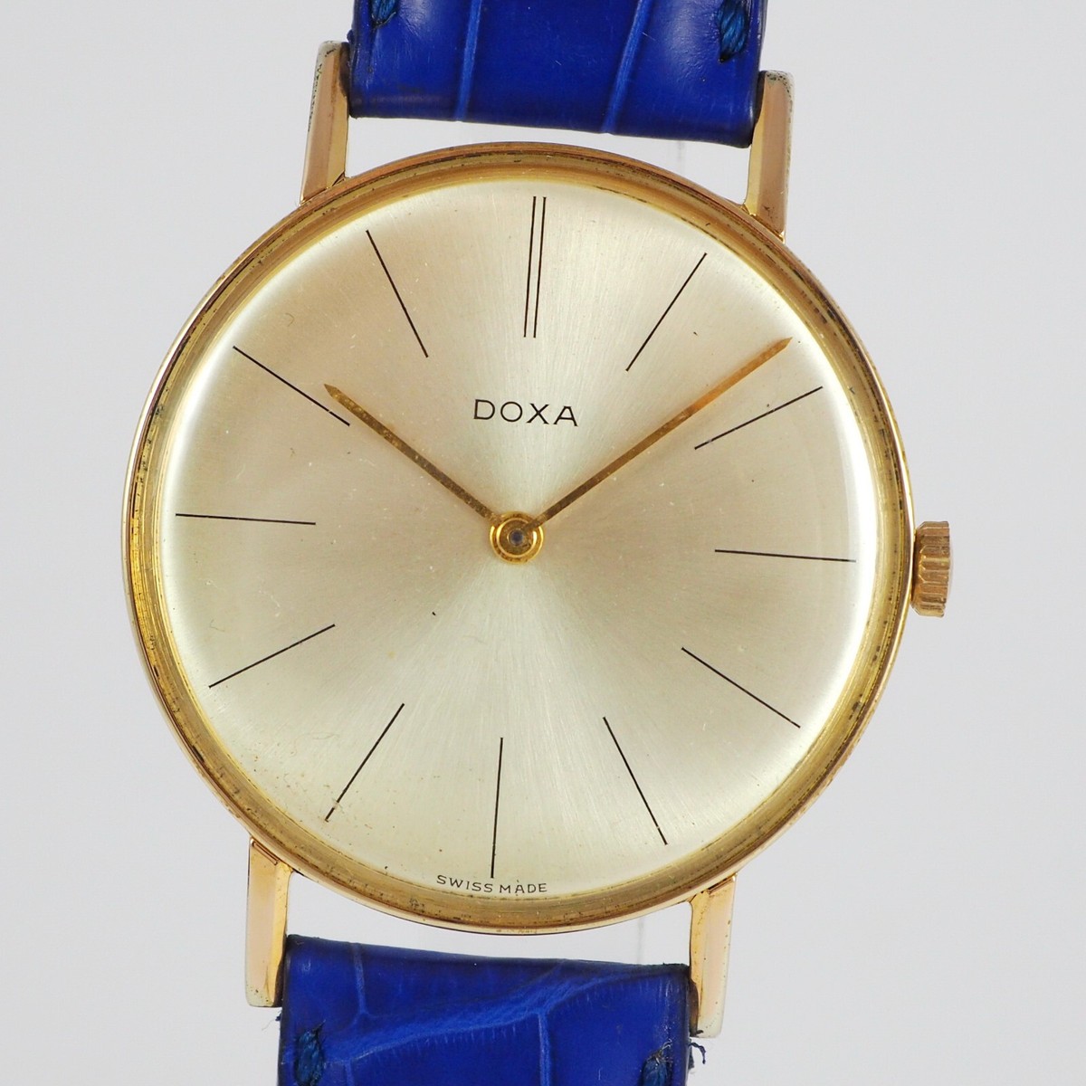 DOXA ultraflache Vintage Herrenarmbanduhr vergoldet 1960er