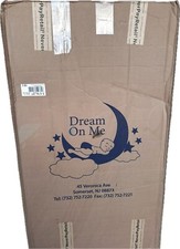 New in box 2 in 1 crib and toddler mattress