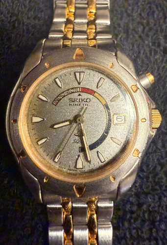 Vintage preowned Seiko Kinetic 3M22-0B80 two tone unisex selfwinding watch