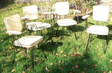 Suite de 4 fauteuils en skaï moiré jaune piètement eiffel années 60