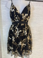 Express black party dress featuring gold/white embroidered floral mesh fabric
