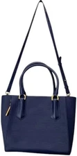 The original DAGNE DOVER MINI TOTE in DAGNE BLUE with shoulder strap.