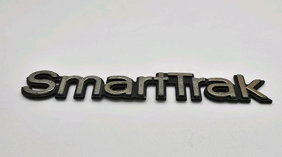 Oldsmobile Bravada Smart Trak 1996-2001 emblema OEM Foto 3 de 4