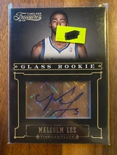 A69053 - 2012-13 Timeless Treasures Silver #215 Malcolm Lee Auto/25