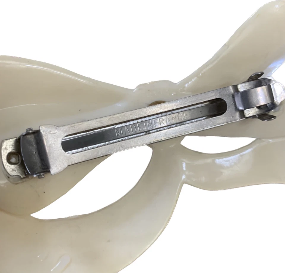 Boreta de arco de plástico beige marfil años 80 90 inusual vintage Foto 3 de 4