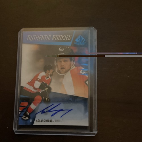 Upper Deck 2023-24 SP Game Used Authentic Rookies Adam Ginning Rookie #211