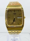 Vintage Seiko SQ Quartz Watch Gold Tone Day Date Square Dial 7813 5049