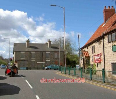 PHOTO  3 WHEELS ON MY WAGGON WAITING AT THE TRAFFIC LIGHTS ON WELBECK ROAD MANSF