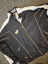 Vintage Puma King track jacket in black and white