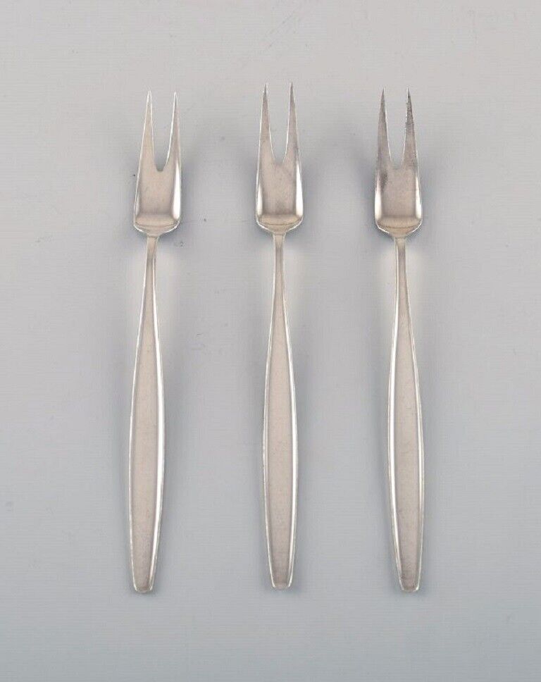 Three Georg Jensen Cypress cold meat forks in sterling silver.