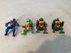 Lot of 4Teenage Mutant Ninja Turtles Action Figures Vintage 1990s