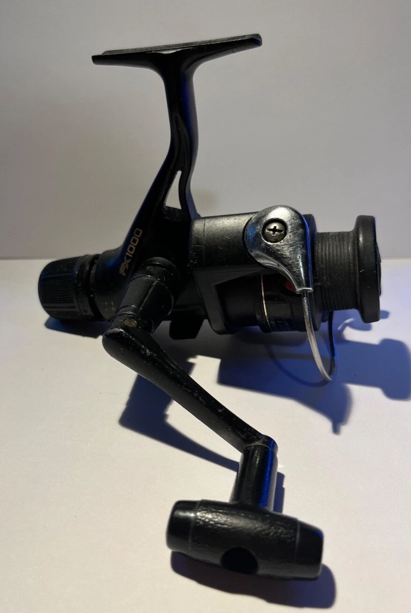 SHIMANO FX 1000 SPINNING REEL- VERY NICE- REAR DRAG