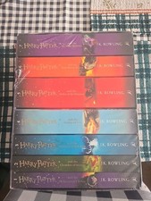 NEW SEALED BOX SET WITH ALL 7 HARRY POTTER BOOKS 1-7 BY J.K. ROWLING NEW NEW SEALED BOX SET WITH ALL 7 HARRY POTTER BOOKS 1-7 BY J.K. ROWLING NEW
