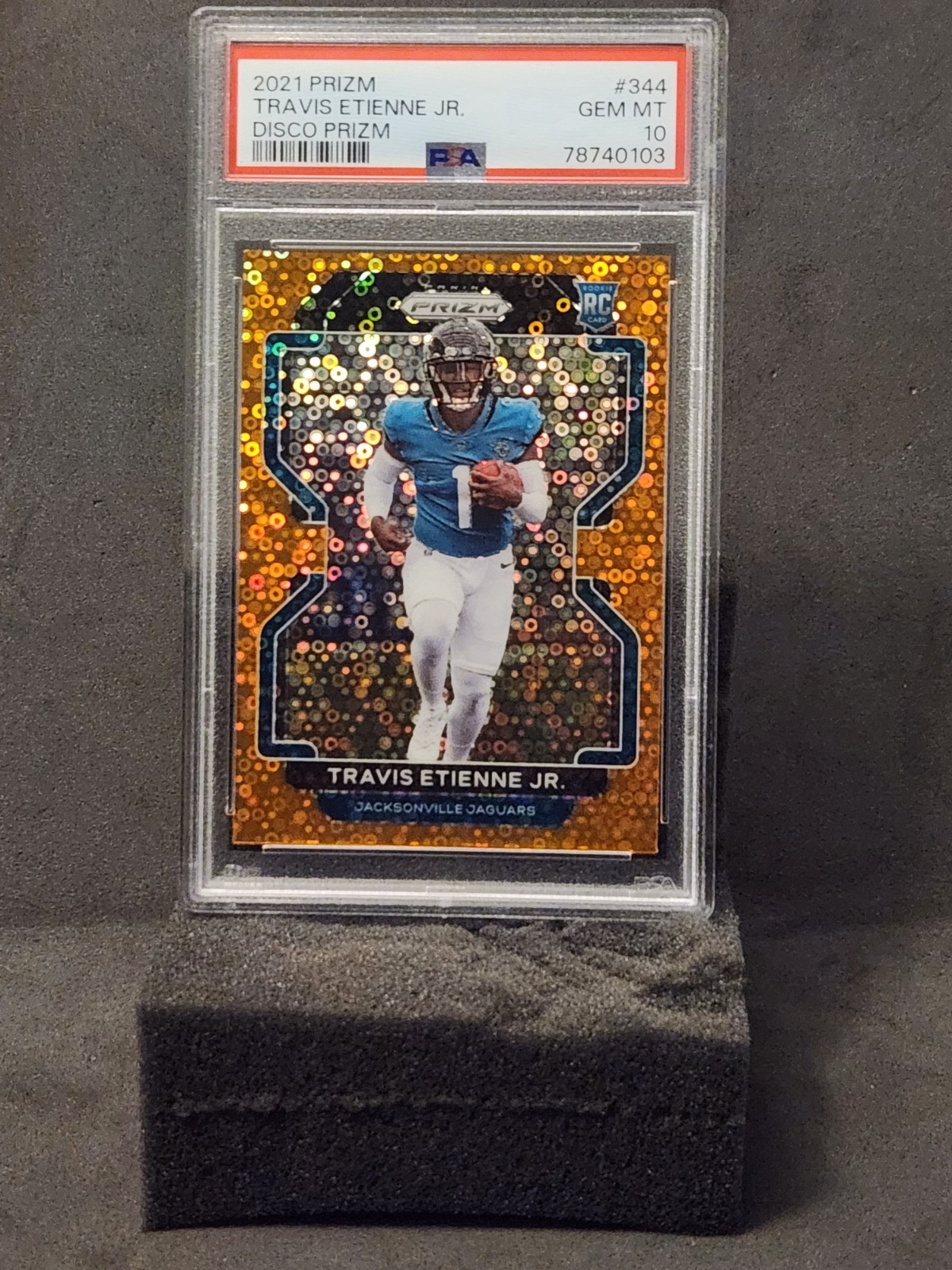 2021 Panini Prizm Travis Etienne Jr RC Orange Disco Prizm #344 PSA 10