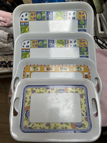 Used plastics trays set of 4