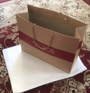 tumi paper bag
