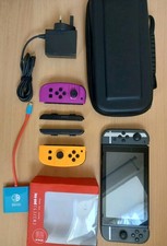 Nintendo Switch Video Game Console bundle - four joy cons, case and four games