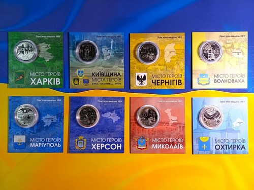 A full set of 8 medals City of Heroes of Ukraine 2022-2023. in booklets