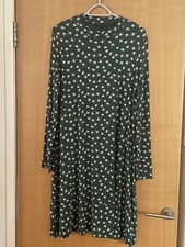 Marks and Spencers dark green viscose and elastane dress with white flowers