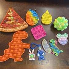 Pop It Fidget Toys Lot Of 11. Different Sizes.