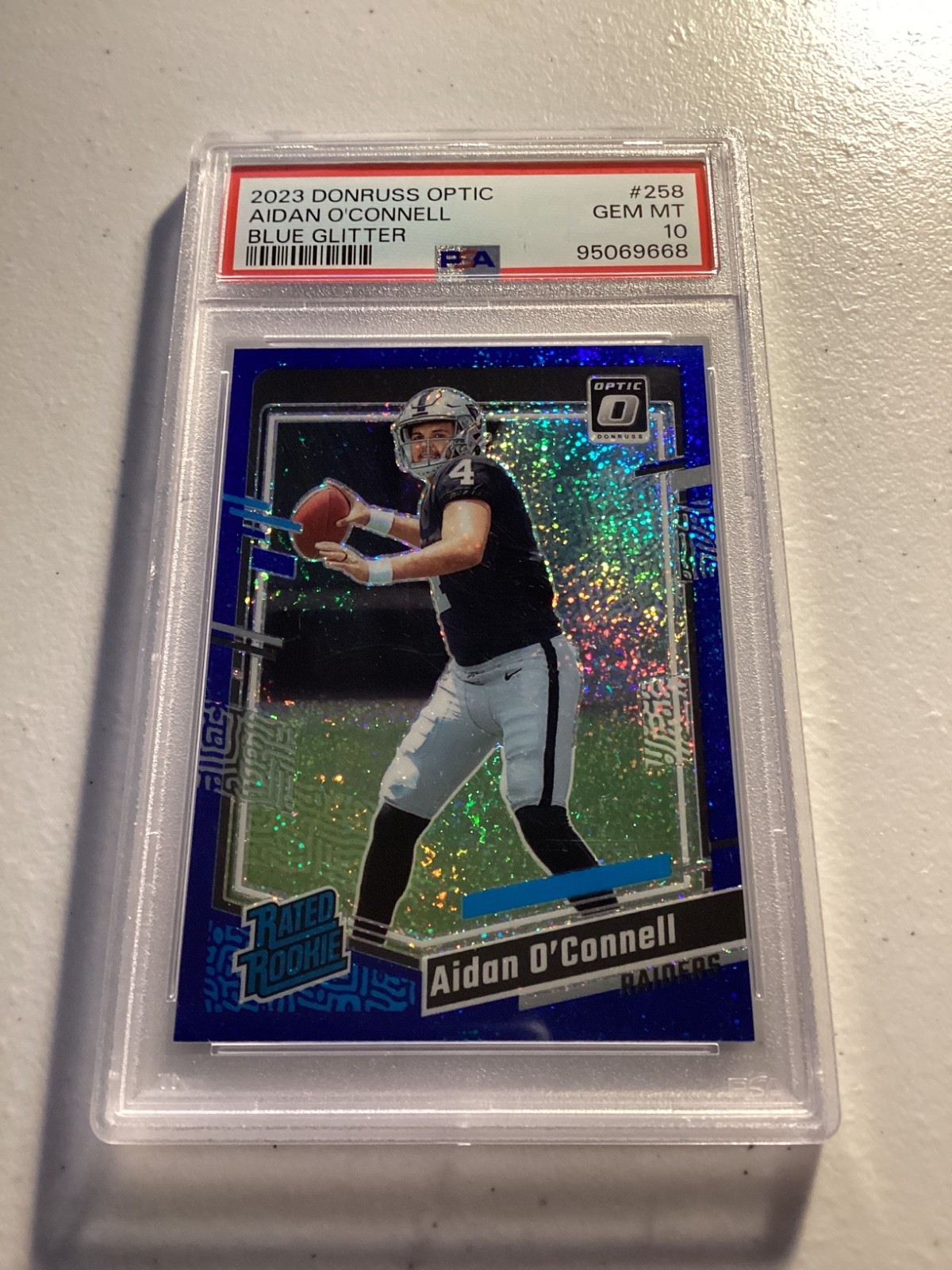 2023 Panini Donruss Optic - Rated Rookie Aidan O'Connell #258 Blue Glitter Prizm