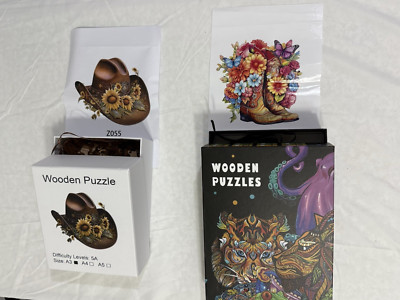 LOT OF 2 WOODEN PUZZELS, COWBOY HAT, BOOTS,FLOWERS, COMPLETE UNIQUE BRAIN TEASER