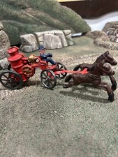 Cast iron horse drawn firemen wagon with horses circa 1890s