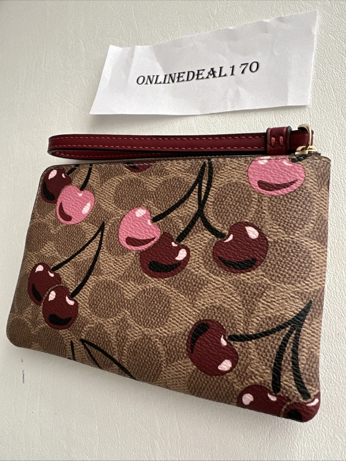 Borsa a tracolla Coach Rowan firmata tela stampa ciliegia CY692 e polso CZ450