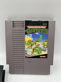 Nintendo NES Teenage Mutant Ninja Turtles Carrello con Manuale e Cover Antipolvere 