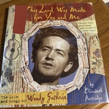 This Land Was Made for You and Me : The Life and Songs of Woody Guthrie by...