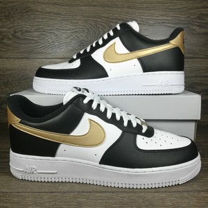 nike air force 1 low black and gold