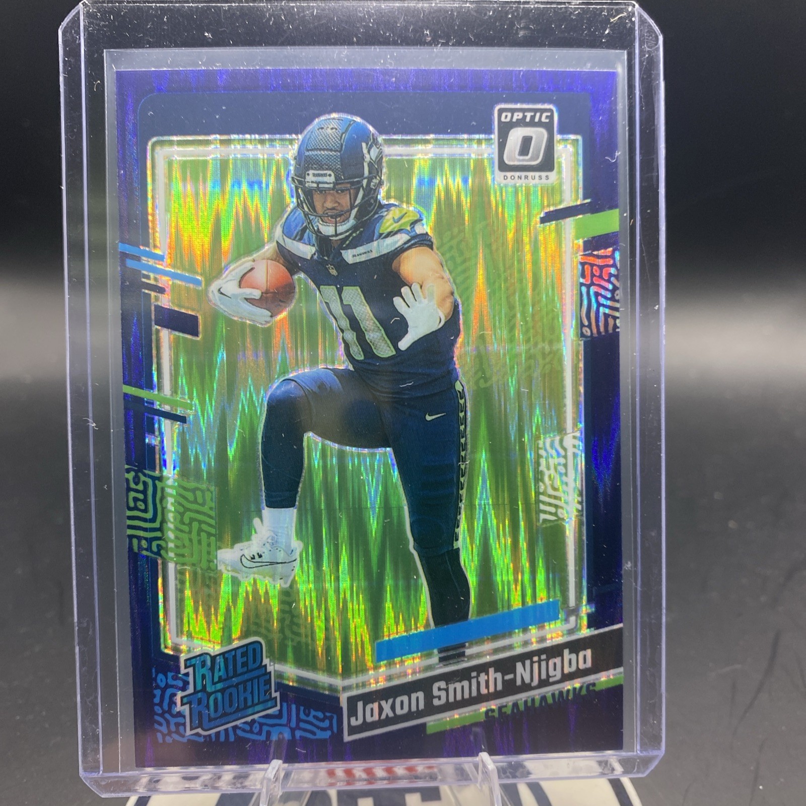 2023 Donruss Optic Rated Rookie Jaxon Smith-Njigba #293 Purple Shock Prizm (RC)