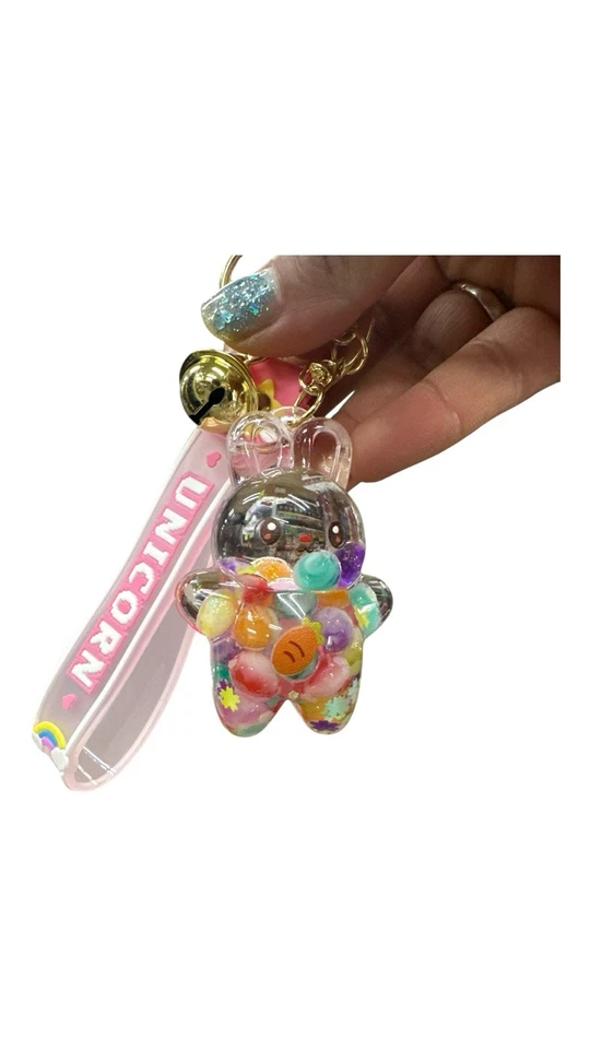 Llavero móvil líquido de dibujos animados conejo oso resorte llavero para mujer niña regalo Foto 3 de 4