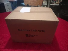 Bambu lab AMS  model SA-001  Brand new in the box.   Never used.